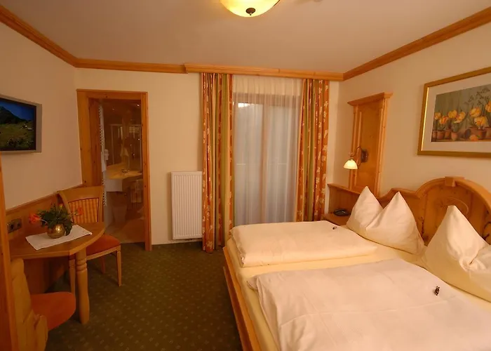 מלון Garni Alpenland 4*